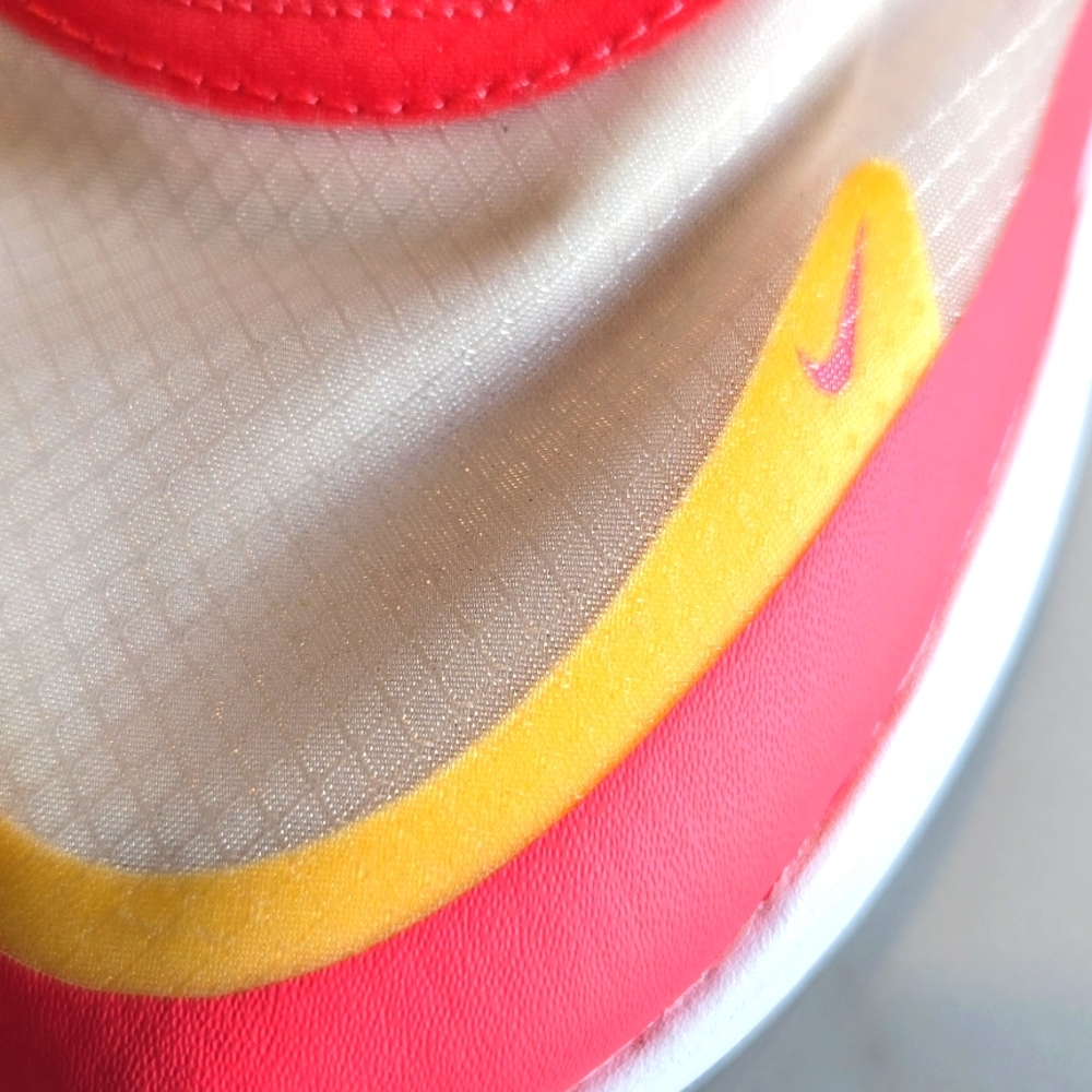 Nike Pink and Yellow Athletic Shoes with Sleek Design - Picture 2 of 6